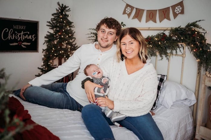 family with baby Christmas photo