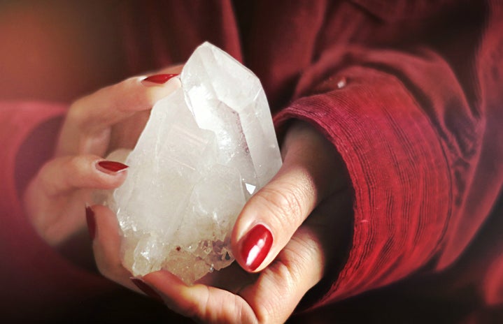 hands holding crystals
