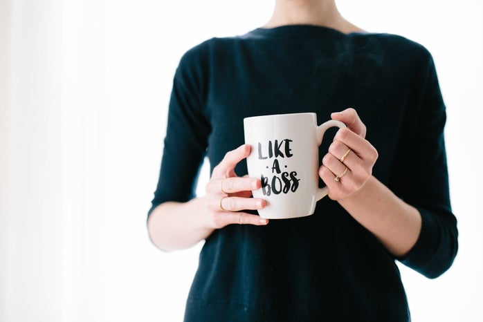 white mug \"like a boss\" logo