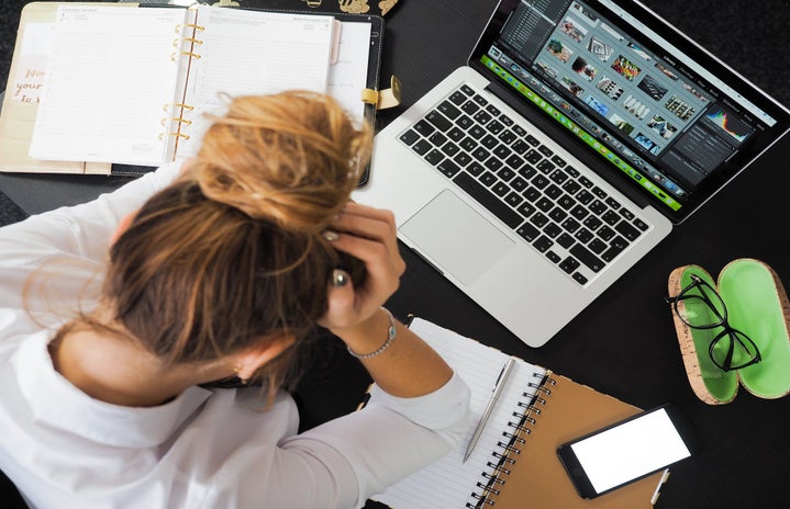 Woman sitting in front of computer