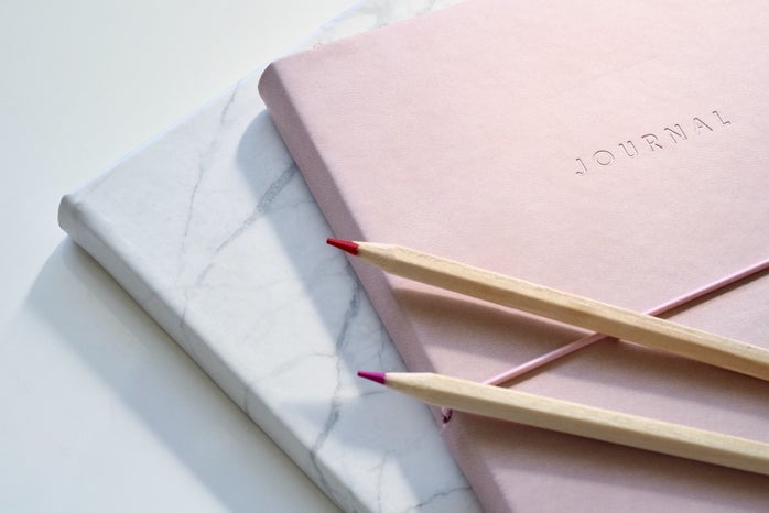 marble and pink notebook
