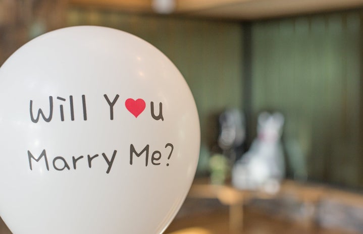 will you marry me sign with a heart