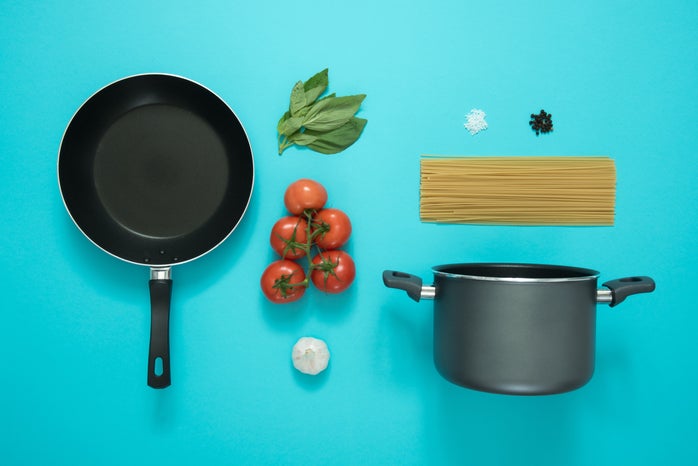 aesthetic layout of cooking supplies on a blue background