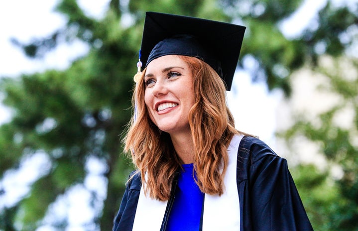 Woman with graduation cap