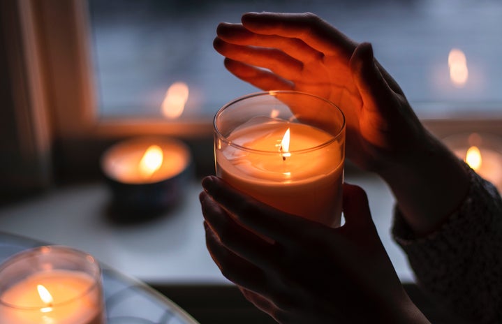 photo of person holding scented candle 3066868jpg?width=719&height=464&fit=crop&auto=webp