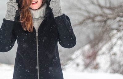 woman snowflakes winter clothing 54206jpg?width=398&height=256&fit=crop&auto=webp