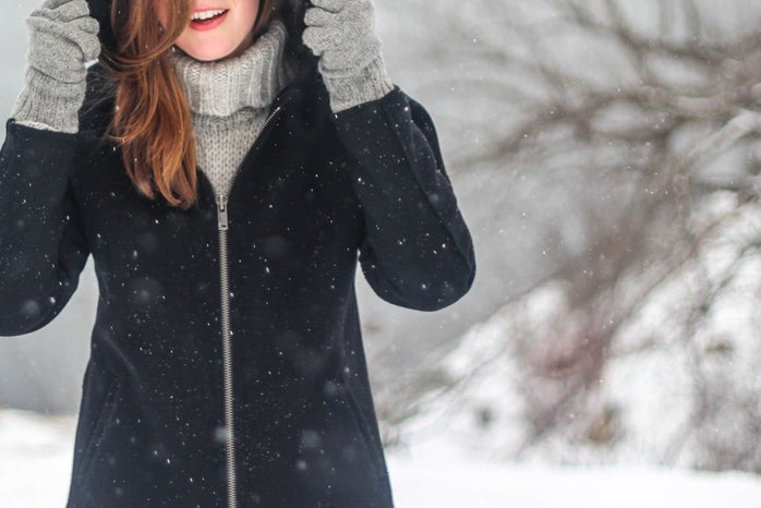 woman snowflakes winter clothing 54206jpg?width=698&height=466&fit=crop&auto=webp