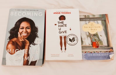 reading books: becoming by michelle obama, the hate u give by angie thomas, the secret life of bees by sue kidd