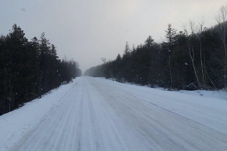 Snowy canadian road in the evening