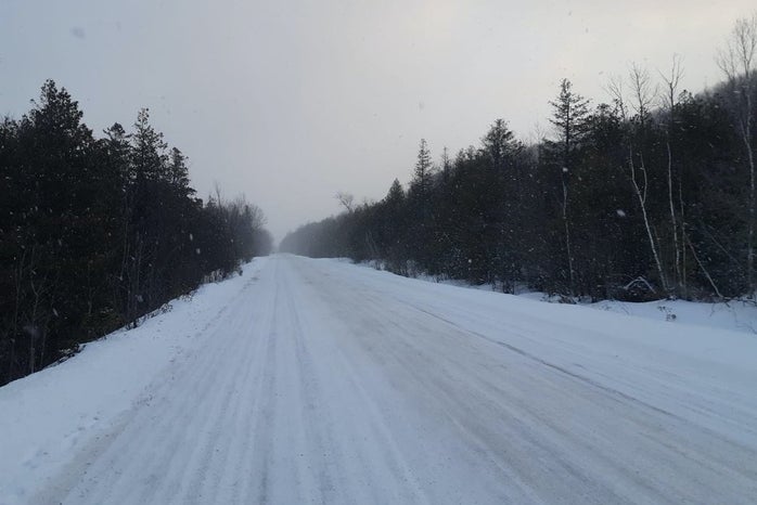 Snowy canadian road in the evening