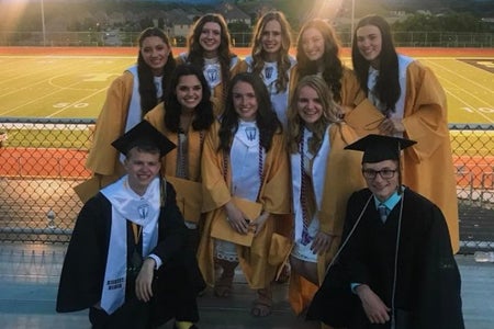 high schoolers graduating