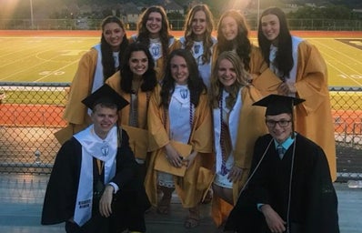 high schoolers graduating