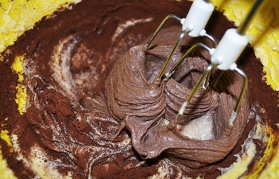 a hand mixer in brownie batter