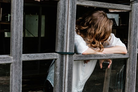 man looking at the window, mental health
