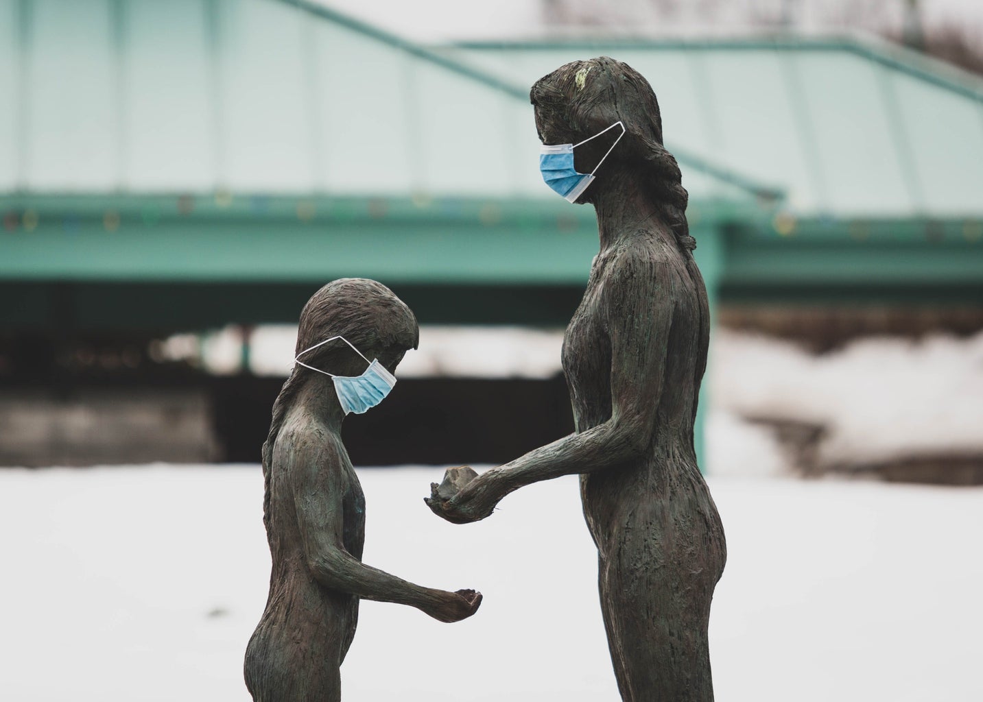 statues with face masks