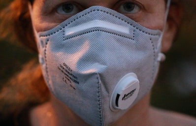 Women wearing a mask for health purpose