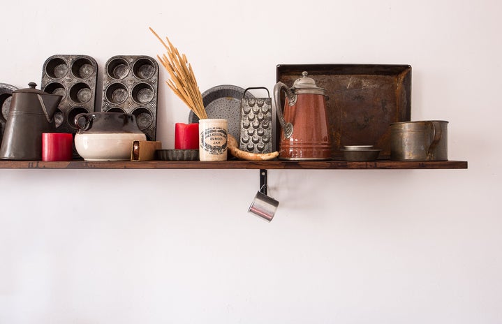 kitchen utensils on a shelf