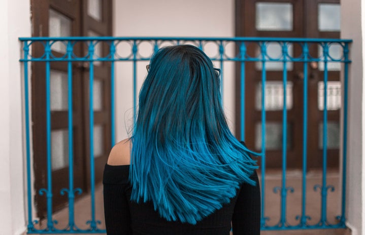 blue haired woman