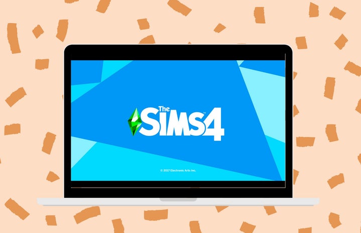 laptop with sims 4 on the screen