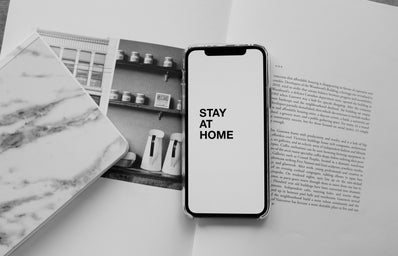 phone screen that says stay at home