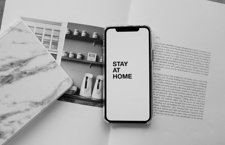phone screen that says stay at home