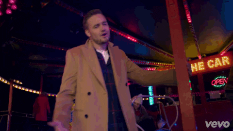 Liam Payne from One Direction shrugging in music video