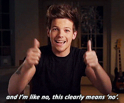 Clip of Louis Tomlinson from One Direction motioning \'no\' GIF