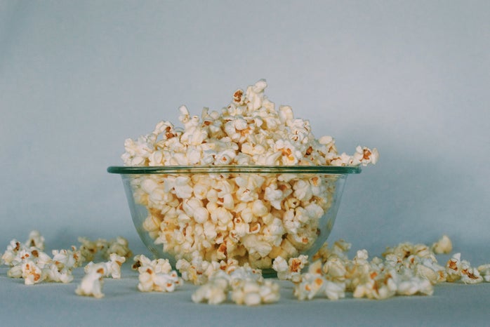 A glass bowl of popcorn