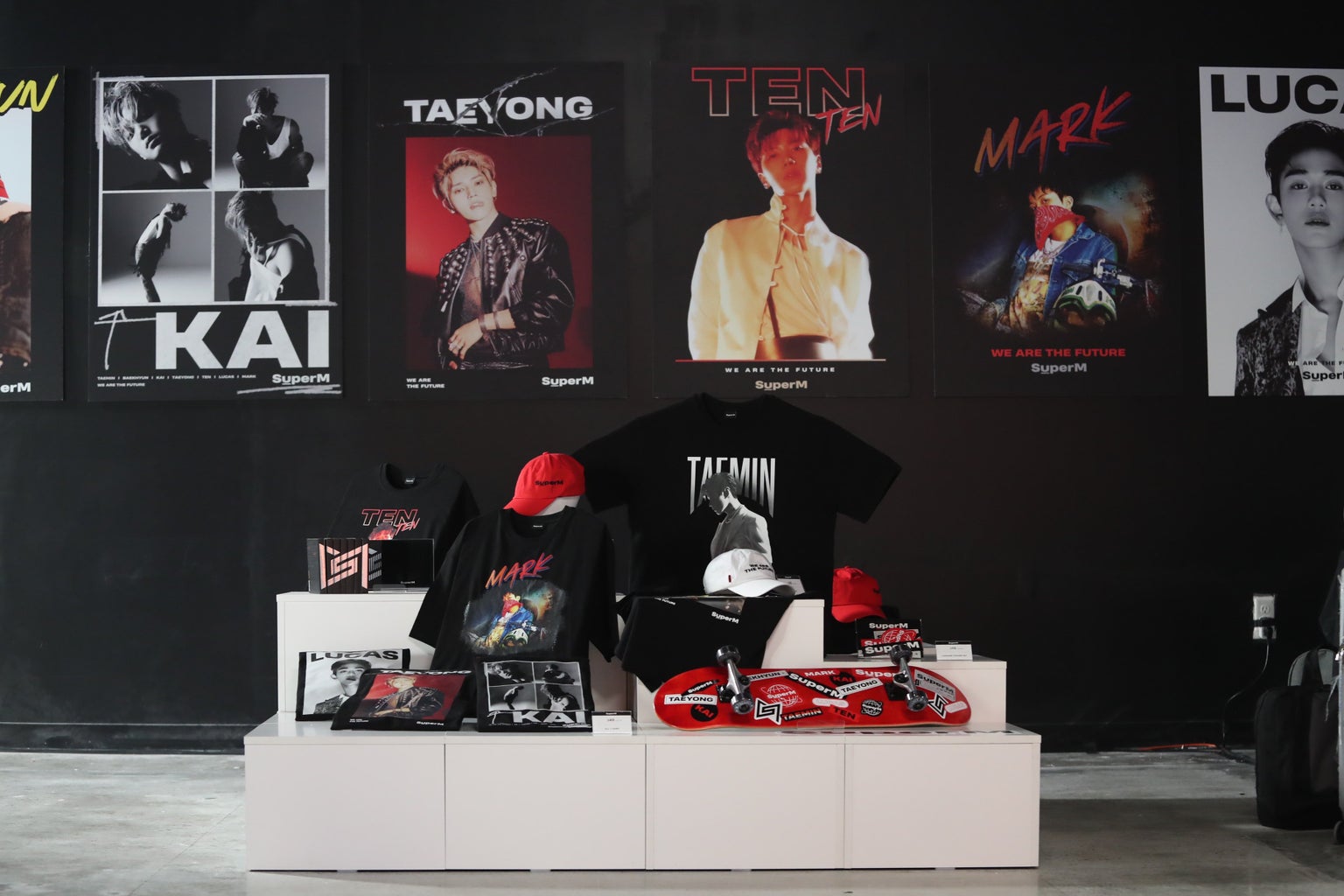 display of k-pop boy group SuperM merchandise