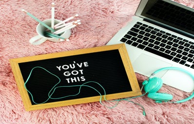 Mac laptop with a You Got This sign
