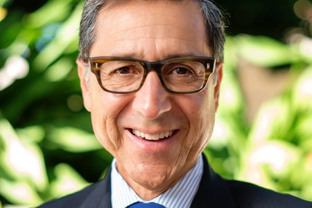 Headshot of John Garcia, the subject of a profile arcticle