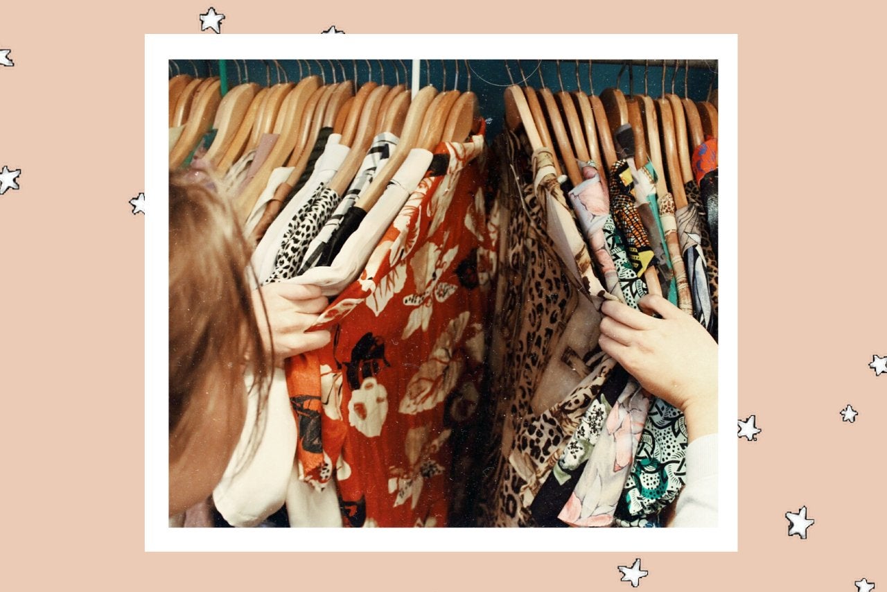 woman browsing through clothes at thrift store?width=1024&height=1024&fit=cover&auto=webp