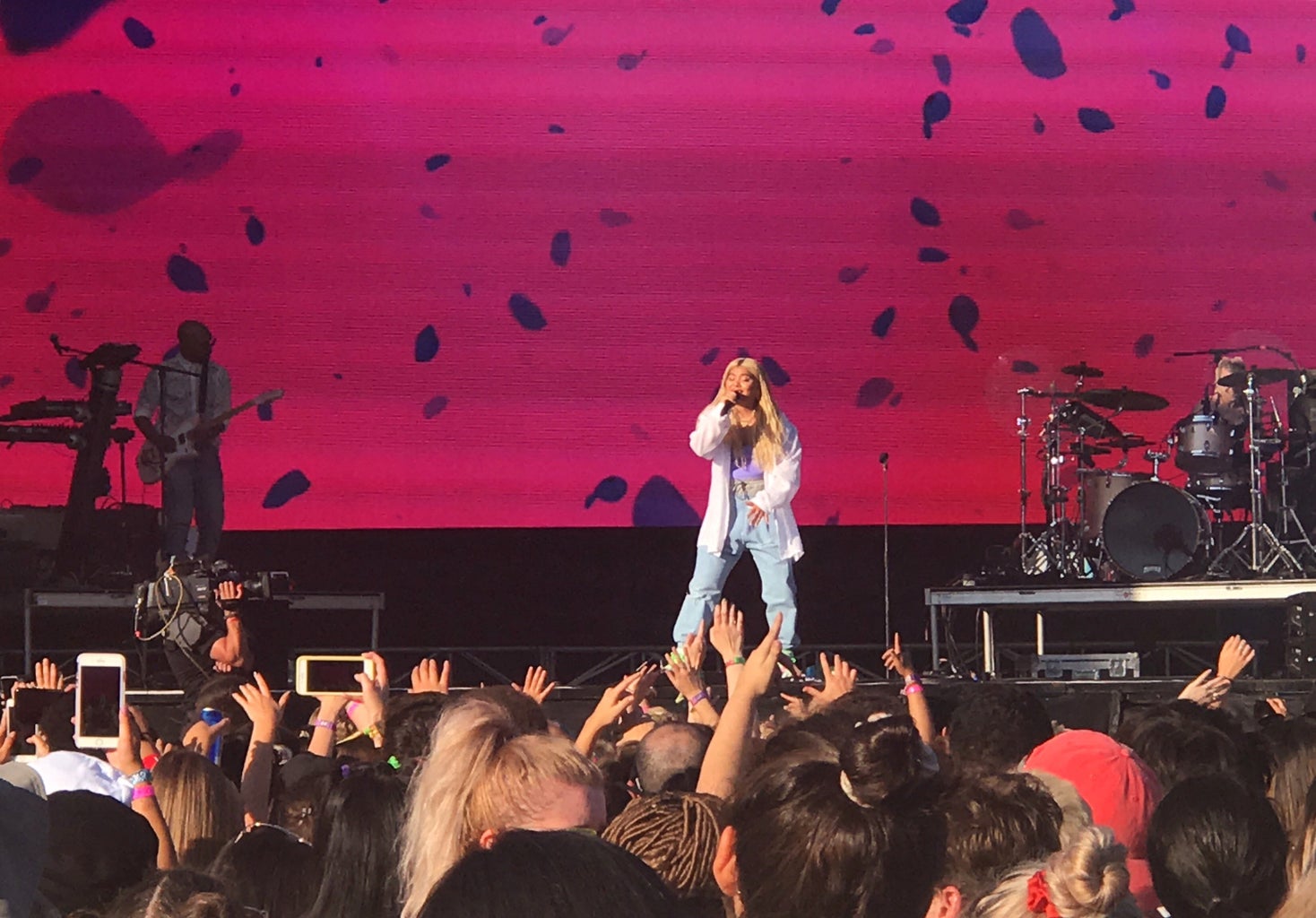 Hayley Kiyoko performing onstage at Lollapalooza