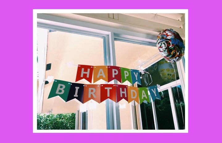 Birthday banner inside home with pink background
