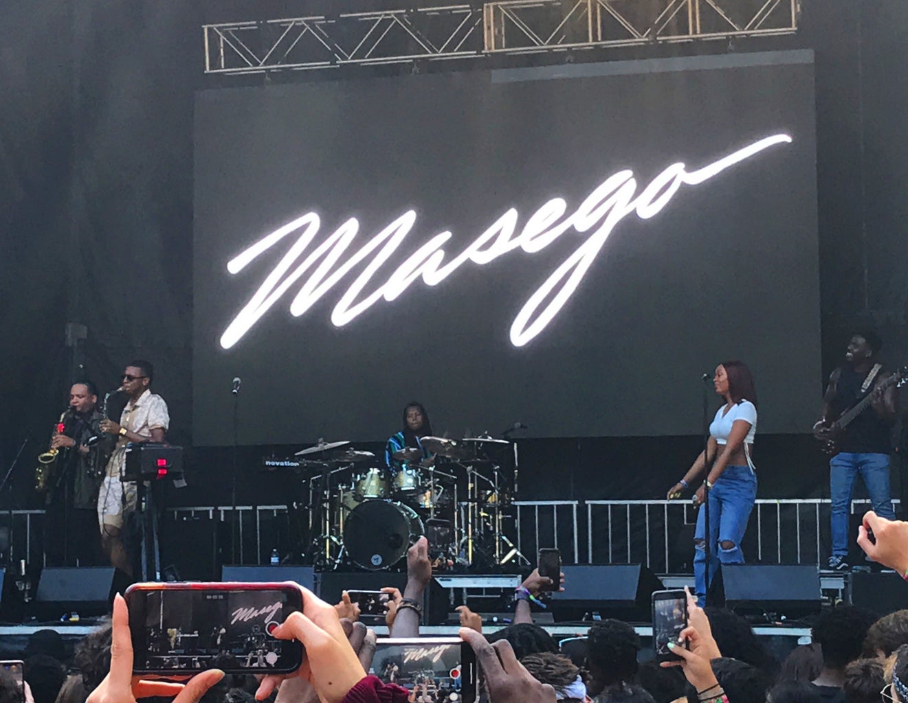 photo of Masego performing onstage at Lollapalooza