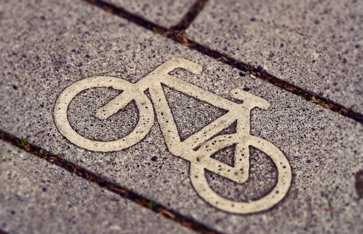 a bike drawn on a sidewalk
