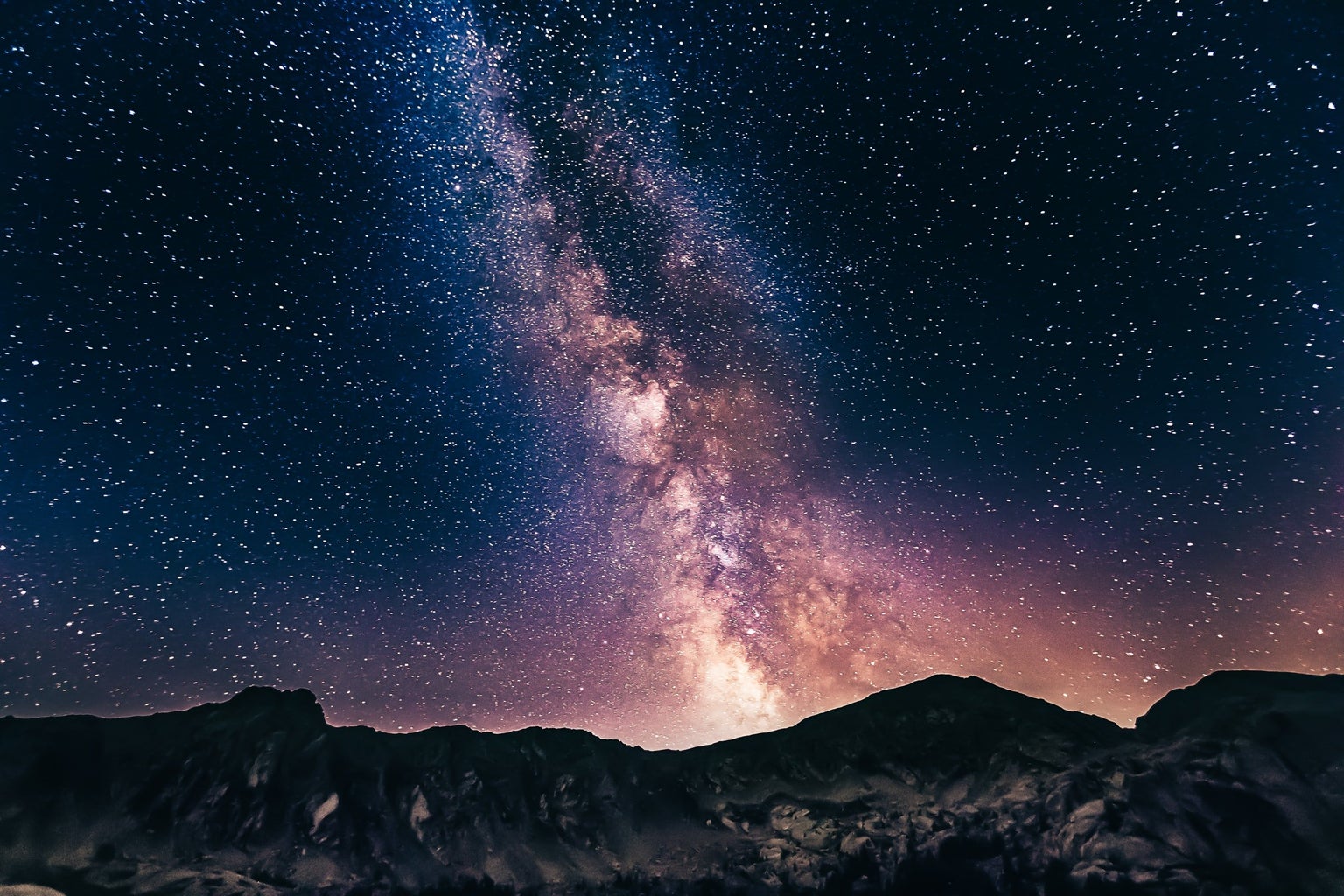 Galaxy of Stars behind mountains
