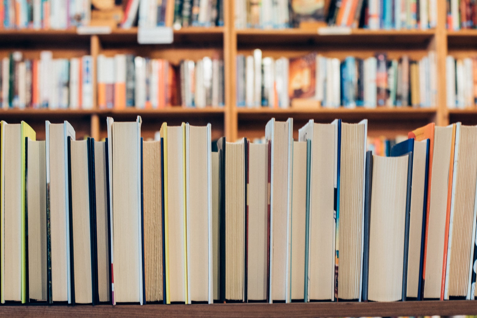 assorted books on a library shelf