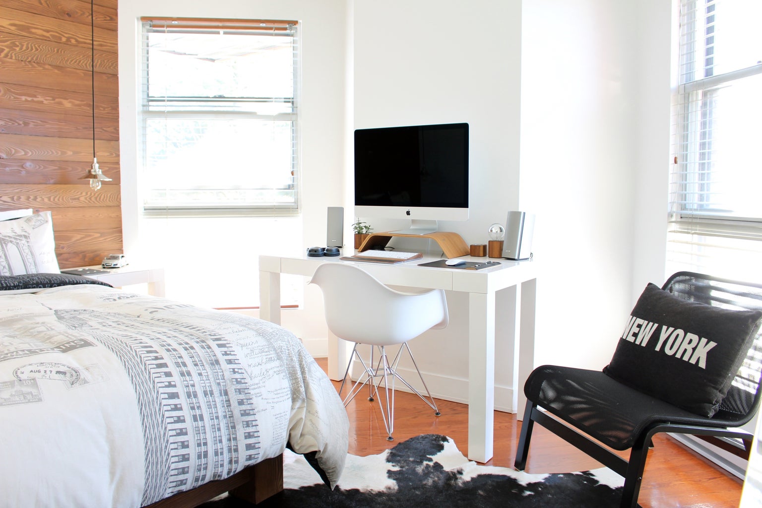 bright white bedroom with desk working space