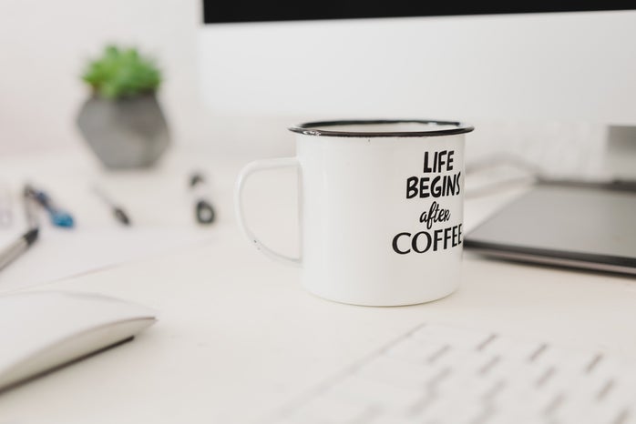 white coffee mug on desk