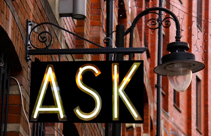Illuminated sign \"ASK\"