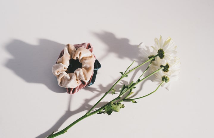 dainty flatlay of scrunchies and flowers?width=719&height=464&fit=crop&auto=webp