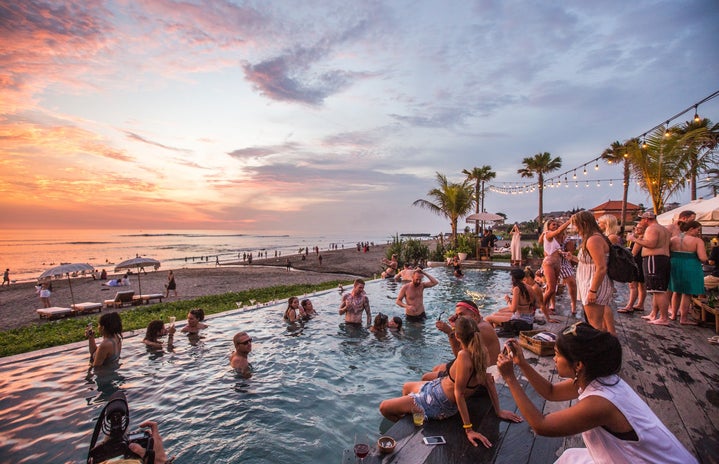 pool party by the water at sunset in summer