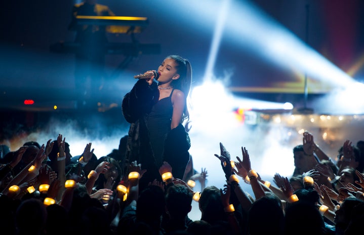 Ariana Grande performing on stage