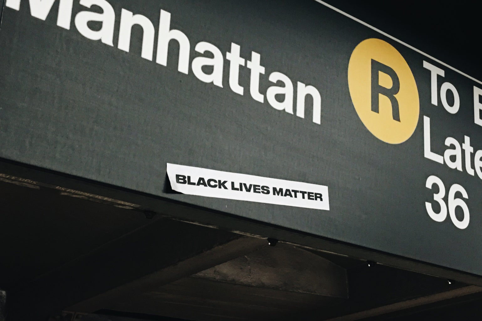 Black Lives Matter sticker on a Manhattan subway sign