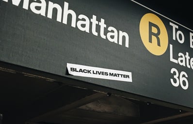 Black Lives Matter sticker on a Manhattan subway sign