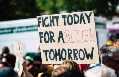 sign saying fight today for a better tomorrow