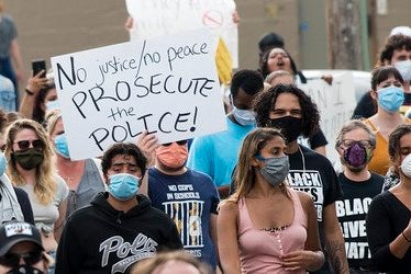 BLM Peaceful Protesters, holding signs