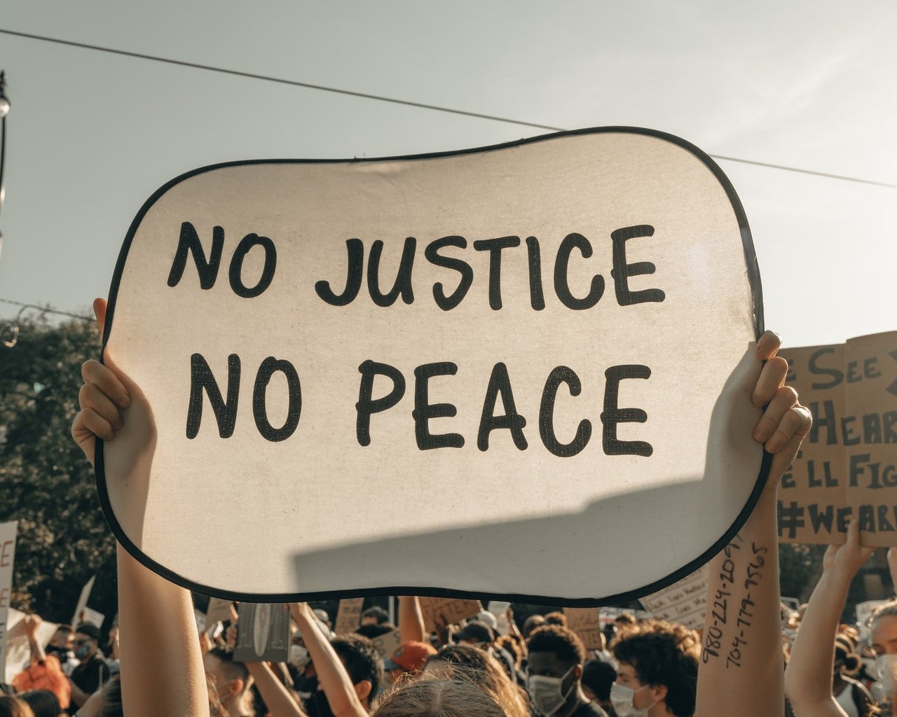 no justice no peace protest sign