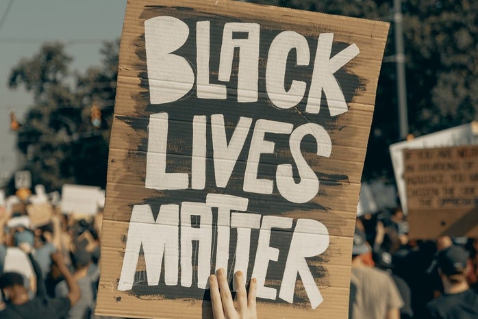 black lives matter sign by Clay Banks?width=698&height=466&fit=crop&auto=webp